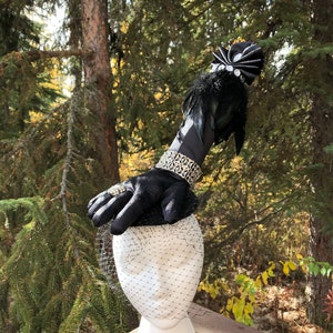 Lady Thing Headpiece Standing Black Satin Glove With Feathers Rhinestones And Jewelry Accents Fascinator Hat Costume Piece