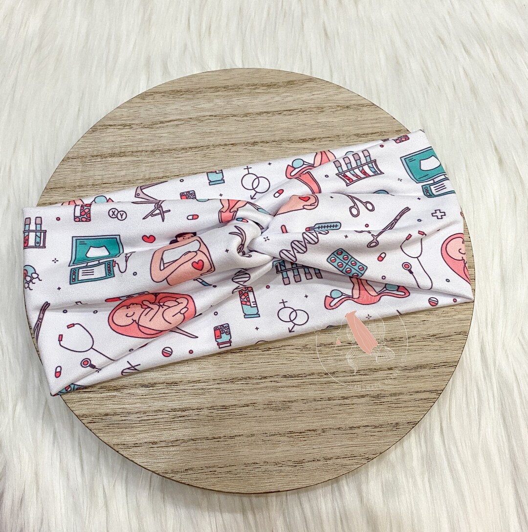 WOVEN TWIST HEADBAND MATERNAL INSTINCT