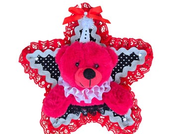 Red Bear Stuffed Animal Taxidermy with red black and white decoration.