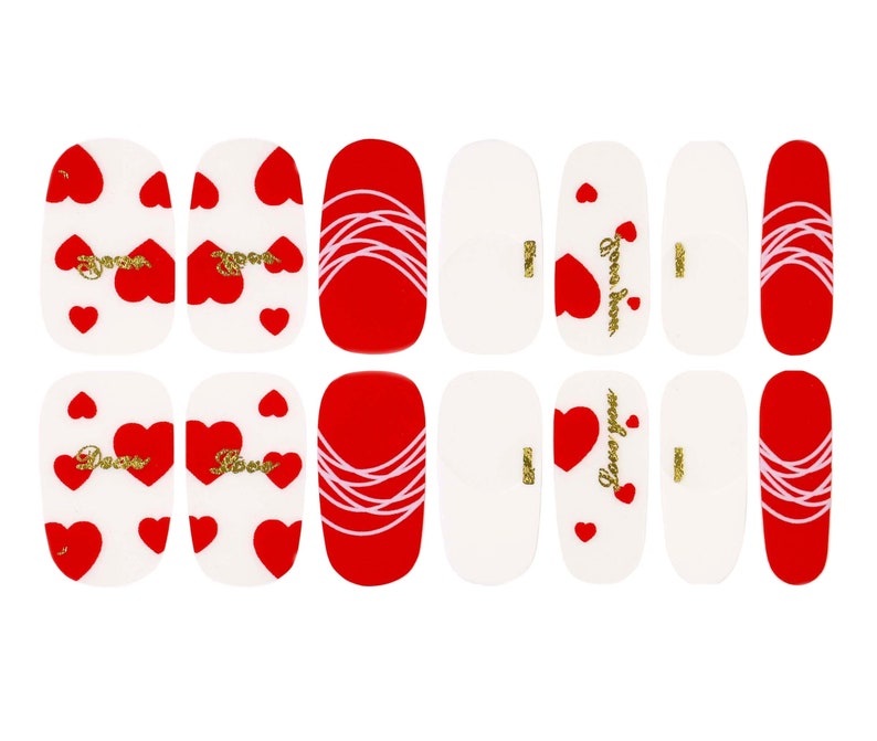May include: Set of 12 red and white nail stickers with heart and swirl designs. Some stickers feature the text "Love you" and "Love always".