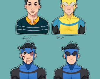 May include: Four character-shaped ornaments. The top left shows a man in a blue sweater and yellow shirt. The top right shows a superhero in a yellow and blue suit. The bottom two show the superhero with injuries and in a blue suit.