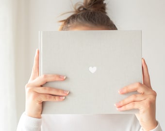 light gray guest book made of linen | HEART | White embossing