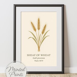 Puede incluir: Impresión artística enmarcada con una ilustración de una gavilla de trigo. La obra de arte incluye el texto "Sheaf of Wheat, God's provision, Salmo 107:9". La impresión está en un marco negro con un paspartú blanco.