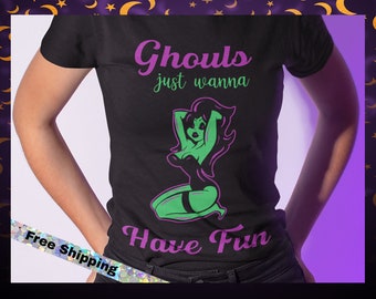 May include: Black t-shirt with a green and purple illustration of a ghoul with the text "Ghouls just wanna Have Fun".