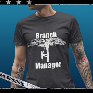 Funny Tree Climber Shirt that says Branch Manager. Makes a great gift for Arborists, Tree Climber, Logger, Line Clearance Workers, Landscape