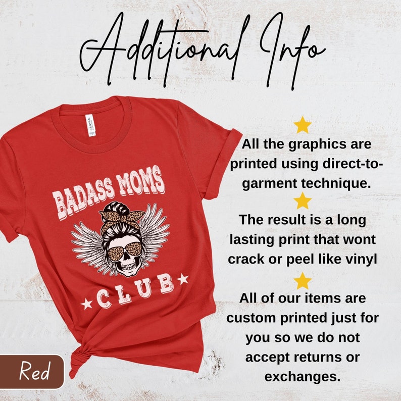 May include: Red t-shirt with a skull graphic and the text "BADASS MOMS *CLUB*" printed on it. The text is in a white font with a black outline. The skull is wearing a bandana with leopard print and a bun. The skull has angel wings.