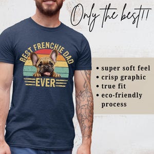 May include: A navy blue t-shirt with a vintage-style graphic of a French bulldog. The graphic says "Best Frenchie Dad Ever".