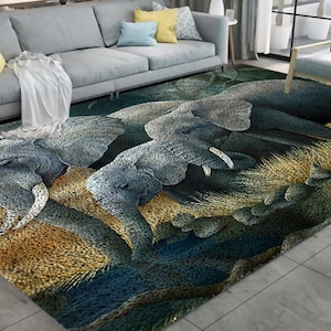 以下が含まれることがあります： 青と金の色の象の模様が施された敷物です。象は様々なポーズをとっており、立っているもの、寝ているもの、歩いているものがあります。敷物は柔らかく、ふわふわとした素材で作られています。