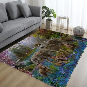 May include: A rectangular area rug featuring a detailed illustration of a wolf pack in a forest setting. The rug has a colorful design with shades of blue, green, pink, and brown. The wolves are the focal point.