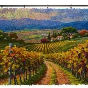 May include: A scenic tapestry depicting a vineyard landscape with rows of grapevines laden with purple grapes. The artwork features a dirt path leading towards a distant house and rolling hills under a colorful sky. The tapestry is mounted on a decorative rod.