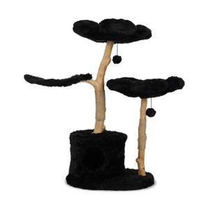 May include: A black cat tree with multiple platforms and a hideaway. The tree features a faux fur covering, natural wood posts wrapped in rope, and dangling pom-poms. The platforms are shaped like clouds.