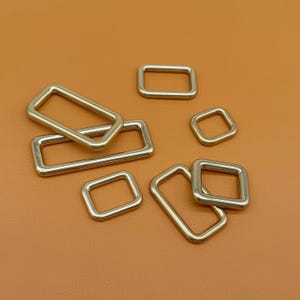 Hebilla de latón ajustable para correa, anillo rectangular para bolsos, carteras y accesorios de herrajes, conector de bucle de metal sin costuras