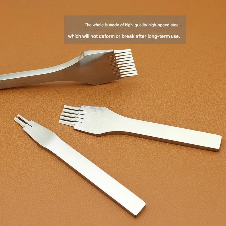 May include: Three silver leathercraft tools are displayed against a brown background. The tools have flat, rectangular handles and various pronged or slotted ends. Text in the image states the tools are made of high-speed steel and won't deform.