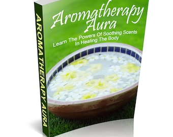 Op de afbeelding: Een boek getiteld "Aromatherapy Aura: Learn The Powers Of Soothing Scents In Healing The Body" met een foto van een kom met water en witte bloemen op een groene grasachtige achtergrond.