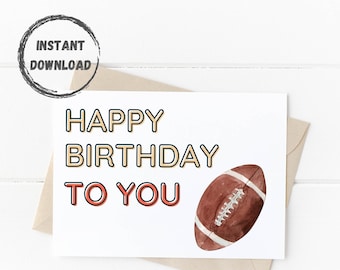 May include: A white card with the text "Happy Birthday to You" in orange and yellow lettering. A brown and white football is on the right side of the card.