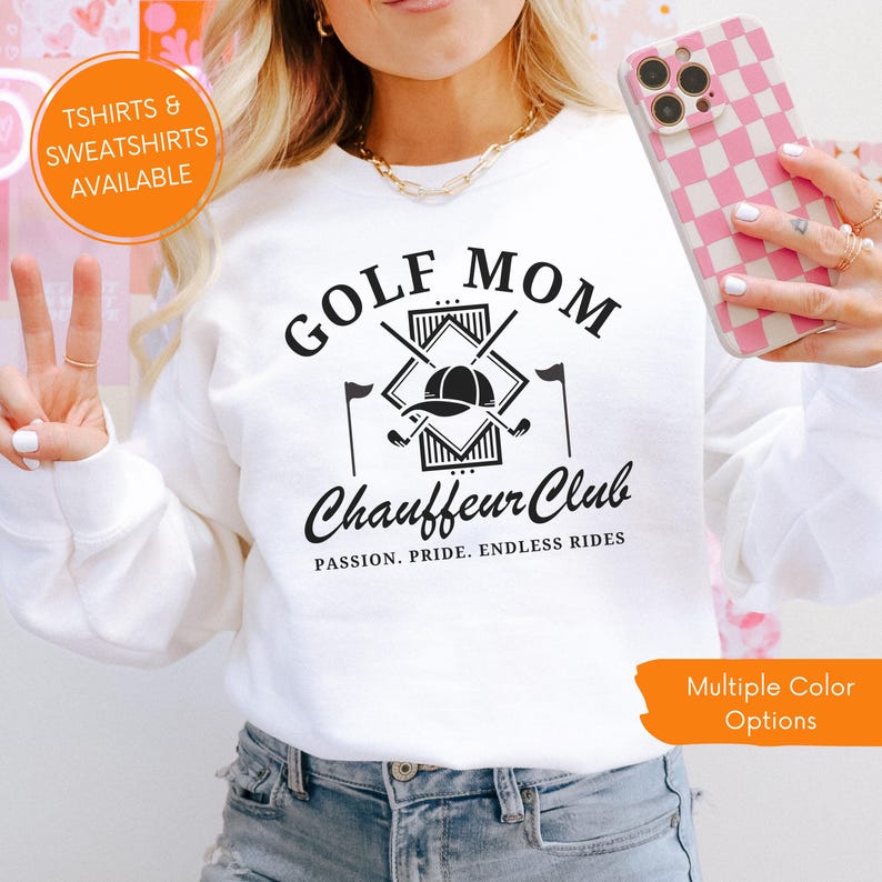 White “Golf Mom Chauffeur Club” sweatshirt shown in mirror selfie. Cozy unisex golf sweatshirt gift for moms and golf lovers, available in multiple colors.