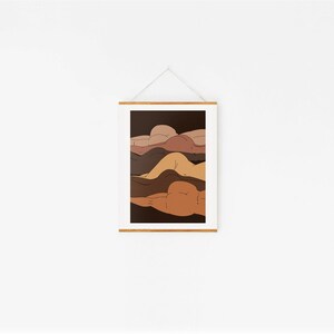 May include: Abstract art print featuring five overlapping figures in shades of brown, beige, and peach. The figures are layered on top of each other, creating a sense of depth and movement.