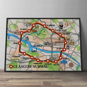 May include: A framed print of the Glasgow Subway map featuring a circular orange transit line connecting various stations. The map includes illustrations of local landmarks, a subway train graphic, and the text GLASGOW SUBWAY in bold black letters.