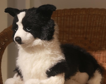 Zwart-witte pluche hond, realistisch grensspeelgoed, zacht knuffeldier Zwart-witte pluche hond, realistisch grensspeelgoed, zacht knuffeldier