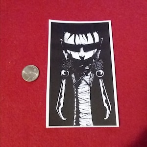 May include: Black and white illustration of a cartoon character with a bandaged face and large hands. The character is wearing a black shirt and has a black band over their eyes. The character is holding two large, sharp objects in their hands.
