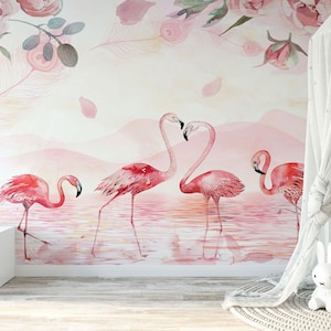 May include: Pink watercolour mural featuring a flock of pink flamingos standing in a pink lake with a pink and white floral design in the top left corner.