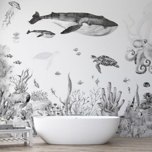 May include: A black and white watercolor illustration of an underwater scene with a whale, octopus, sea turtles, and coral. The illustration is on a white background and is perfect for a bathroom or bedroom.