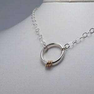 14kt Gold-Filled rings and Sterling Silver Circle Necklace. Hand crafted and custom made.