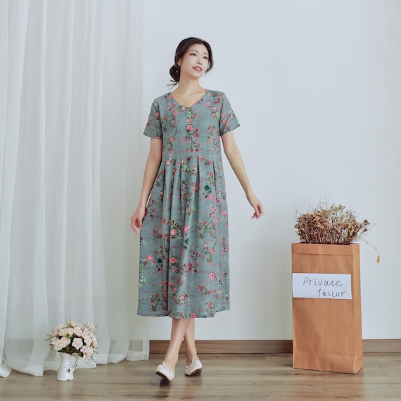 green floral dress maxi Katherine — Dusty Size:Size UK 14/ US 10 This dress features a Christmas Dog Dresses for FEMME FATALE