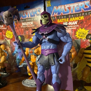 Action Figure stands for “Strong-Man” Revelation style figures.