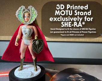 May include: 3D printed stand designed for a She-Ra action figure. The stand is white with the words "Masters of the Universe" printed on it. The stand is designed to fit the stance of the She-Ra figure, but it is not guaranteed to fit all Princess of Power figures. The figure and riser are not included.