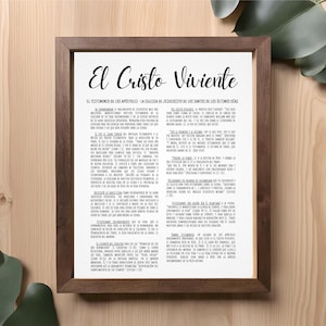 May include: A framed print with a white background and black text. The text reads "El Cristo Viviente" and "El Testimonio de los Apostoles - La Iglesia de Jesucristo de los Santos de los Ultimos Dias".