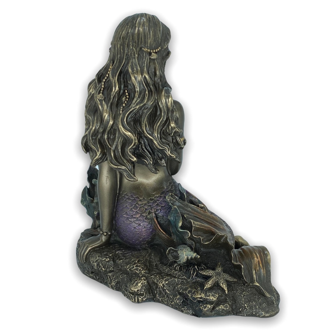 bronze mermaid figurine