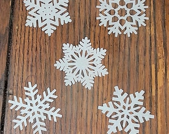 2" wafer paper snowflakes pre cut.  Wafer snowflakes cake, cookie, hot chocolate, cupcake topper.