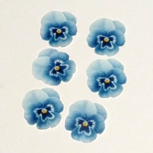 1.5&quot; blue pansy. 2D edible wafer paper flowers for cake and cupcake decorating.