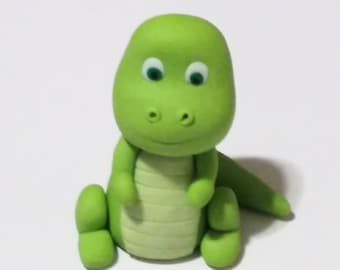 Fondant dinosaur cake topper