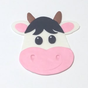 Fondant cow cake topper