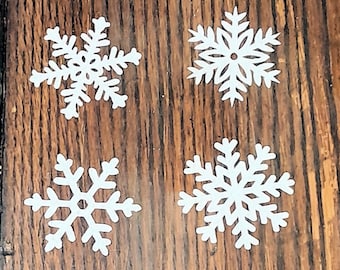 2" pre-cut wafer paper snowflakes.  Wafer snowflakes cake, cookie, hot chocolate, cupcake topper.