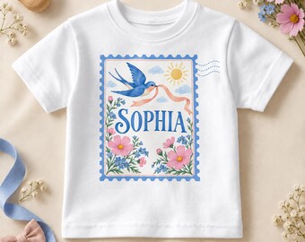 Personalised Floral Postage Stamp Kids T-Shirt with Name, Flying Swallow and Wavy Postmark Lines