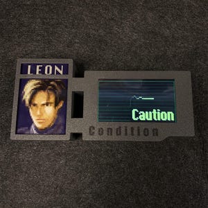 3D-utskriven Resident Evil-serie Klassisk hälsotillståndsbar Interaktiv Leon RE-serie Het karaktärsstatusskärm