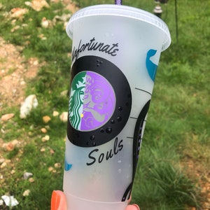 The Little Mermaid Ursula Reusable 24 oz cup with lid and purple sparkle straw