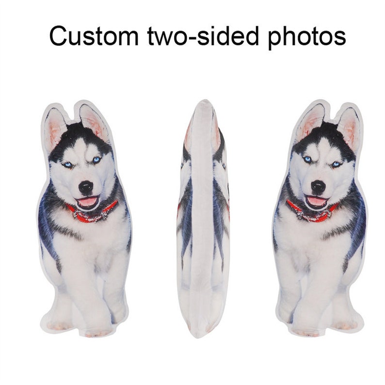 May include: A custom two-sided pillow featuring a black and white husky dog with blue eyes. The pillow is white with a red collar on the dog.