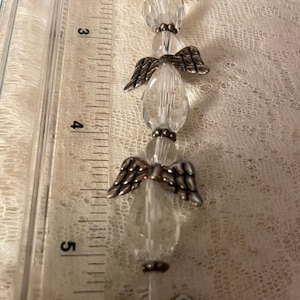 Beads, Angels, each angel 1 1/8”, 8 per string,