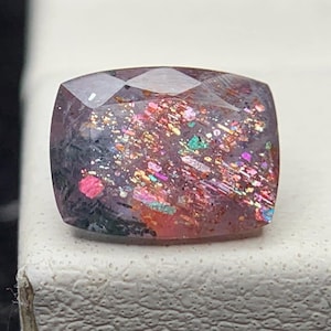 Natural Multi Flakes Bloodshot Iolite Sunstone 1.28 Carat 8.1x6.1 MM Cushion Shape Faceted Gemstone