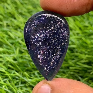 Natural Rare Multi Flakes Iolite Sunstone 34x22 Pear Shape 34.30 Carat Cabochon Gemstone For Jewelry Making