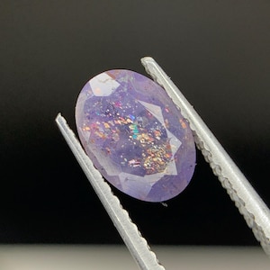 Natural Multi Flakes Bloodshot Iolite Sunstone 0.77 Carat 7.7x5.5 MM Oval Shape Faceted Gemstone