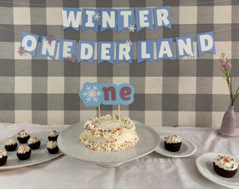 Zimowy baner urodzinowy ONEderland, pierwsze urodziny