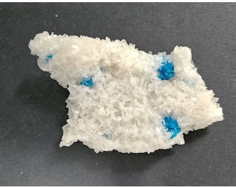 Cavansite Crystals on a thin sheet of Heulandanite from Pune in India
