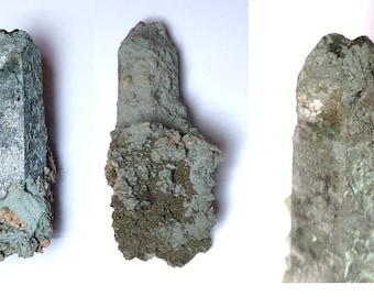 Eccentric chlorite quartz point with green encrustations