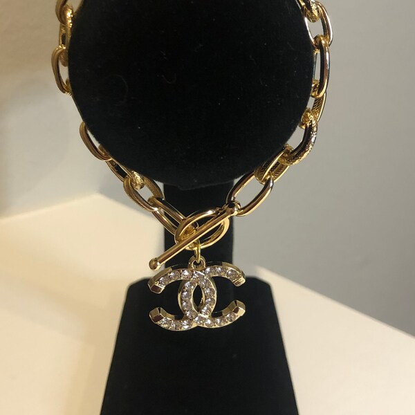 18k Gold Toggle Bracelet with Designer Rhinestone Pendant
