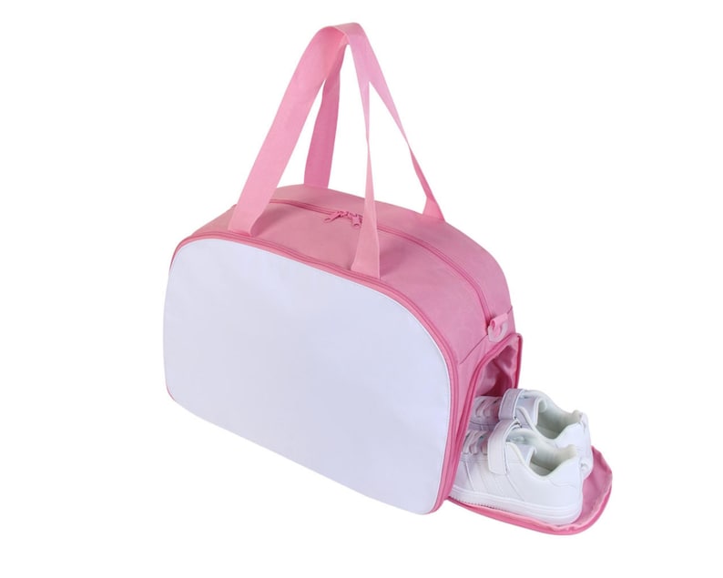 May include: Pink and white duffel bag with a zippered opening and a white interior. The bag is open and two white sneakers are visible inside.